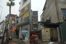 Ngôi nhà có hình tam giác sau giải phóng mặt bằng nhưng vẫn đủ điều kiện xây dựng và đã được cấp phép xây dựng theo quy định. (Ảnh: Mạnh Khánh/TTXVN)