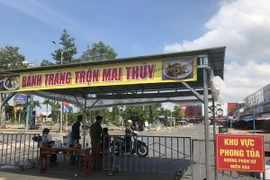 Cơ quan chức năng phong tỏa chợ đầu mối Bà Rịa, thành phố Bà Rịa, tỉnh Bà Rịa-Vũng Tàu. (Ảnh: Hoàng Nhị/TTXVN)