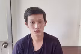 Đối tượng Nguyễn Văn Đức tại cơ quan công an. (Ảnh: Lê Đức Hoảnh/TTXVN)