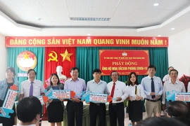 Các công ty ủng hộ mua vaccine phòng COVID-19 tiêm miễn phí cho tất cả người dân trên địa bàn tỉnh. (Ảnh: Tiên Minh/TTXVN)