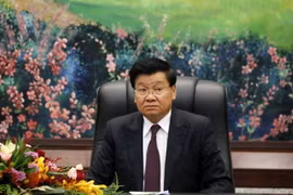 Tổng Bí thư Đảng Nhân dân Cách mạng Lào Thongloun Sisoulith điện đàm với Tổng Bí thư Ban Chấp hành Trung ương Đảng Cộng sản Việt Nam Nguyễn Phú Trọng. (Ảnh: Phạm Kiên/TTXVN)