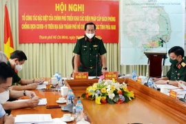 Thượng tướng Võ Minh Lương, Thứ trưởng Bộ Quốc phòng, Tổ trưởng Tổ công tác đặc biệt của Chính phủ về phòng, chống COVID-19 tại các tỉnh phía Nam chủ trì hội nghị. (Ảnh: TTXVN phát)