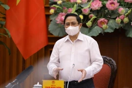 Thủ tướng Phạm Minh Chính phát biểu chỉ đạo tại cuộc họp khẩn về các biện pháp phòng, chống COVID-19 trước tình hình dịch bệnh đang có diễn biến phức tạp ngày 30/4. (Ảnh: Văn Điệp/TTXVN)