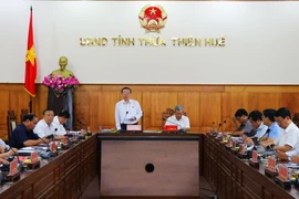 Phó Chủ tịch Quốc hội Phùng Quốc Hiển phát biểu tại buổi làm việc. (Ảnh: Tường Vi/TTXVN)