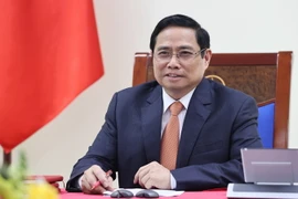 Thủ tướng Phạm Minh Chính điện đàm với Thủ tướng Singapore Lý Hiển Long. (Ảnh: Dương Giang/TTXVN)
