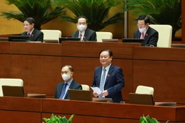 Bộ trưởng Bộ Nông nghiệp và Phát triển Nông thôn Lê Minh Hoan giải trình làm rõ vấn đề Đại biểu Quốc hội nêu. (Ảnh: Phương Hoa/TTXVN)