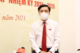 Tổng Thư ký, Chủ nhiệm Văn phòng Quốc hội, Chánh Văn phòng Hội đồng Bầu cử Quốc gia Bùi Văn Cường trả lời phỏng vấn các cơ quan thông tấn, báo chí. (Ảnh: Phạm Kiên/TTXVN)