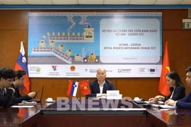 Ông Vũ Bá Phú, Cục trưởng Cục Xúc tiến thương mại thuộc Bộ Công Thương, chủ trì hội nghị trực tuyến. (Ảnh: Uyên Hương/BNEWS/Vietnam+)