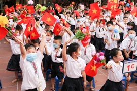 Học sinh trong lễ khai giảng năm học 2020-2021. (Ảnh: Thanh Tùng/TTXVN phát)