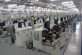 Công ty TNHH ITM Semiconductor Việt Nam, khu công nghiệp VSIP, tỉnh Bắc Ninh duy trì, đảm bảo hoạt động sản xuất. (Ảnh: Thái Hùng/TTXVN)