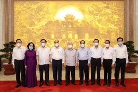 Các vị lãnh đạo Đảng, Nhà nước và các đại biểu dự Phiên họp. (Ảnh: Trí Dũng/TTXVN)