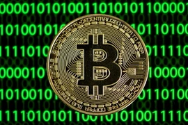 Đồng tiền kỹ thuật số Bitcoin. (Ảnh: AFP/TTXVN)