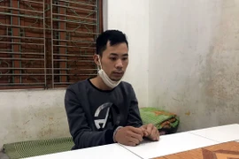 Đối tượng Phạm Văn Việt tại cơ quan điều tra. (Nguồn: TTXVN phát)