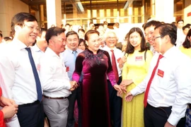 Chủ tịch Quốc hội Nguyễn Thị Kim Ngân với các nhà báo tại buổi gặp mặt. (Ảnh: Trọng Đức/TTXVN)