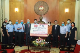 Lễ trao tiền ủng hộ của Tổng hội Thương mại Đài Loan tại Việt Nam tới Ủy ban Trung ương Mặt trận Tổ quốc Việt Nam. (Nguồn: Vietnam+) 