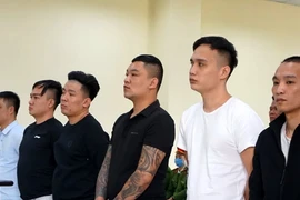 Các bị cáo tại phiên tòa. (Ảnh: Nguyễn Nam/TTXVN)