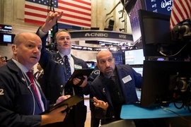 Giao dịch viên tại Sàn giao dịch chứng khoán New York, Mỹ ngày 18/3/2020. (Nguồn: THX/TTXVN)