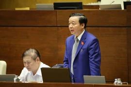 Bộ trưởng Bộ Tài nguyên và Môi trường Trần Hồng Hà giải trình ý kiến của đại biểu Quốc hội. (Ảnh: Doãn Tấn/TTXVN)