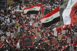 Hàng nghìn người Iraq tuần hành tại trung tâm thủ đô Baghdad yêu cầu Mỹ rút quân khỏi nước này ngày 24/1/2020. (Nguồn: AFP/TTXVN)