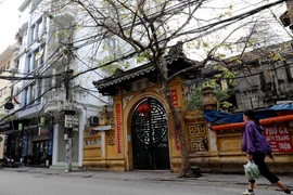 Đường phố Hà nội vắng vẻ trong những ngày thực hiện giãn cách xã hội. (Nguồn: TTXVN)