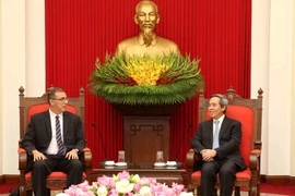 Trưởng ban Kinh tế Trung ương Nguyễn Văn Bình tiếp Trưởng đại diện mới của Quỹ Tiền tệ Quốc tế tại Việt Nam. (Ảnh: Phương Hoa/TTXVN)