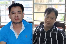 Đối tượng Mai Thanh Phong (trái) và Trương Văn Bé Chính tại cơ quan điều tra. (Ảnh: Thanh Tân/TTXVN)