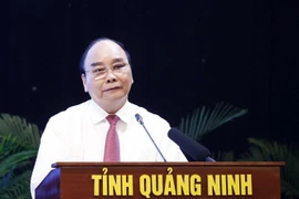 Chủ tịch nước Nguyễn Xuân Phúc phát biểu chỉ đạo tại Hội thảo. (Ảnh: Thống Nhất/TTXVN)