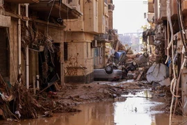 Cảnh tàn phá sau trận lũ quét do bão Daniel tại Derna, miền đông Libya ngày 11/9/2023. (Ảnh: AFP/TTXVN)