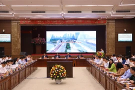 Quang cảnh buổi làm việc của Thường trực Chính phủ với Ban Thường vụ Thành ủy Hà Nội. (Ảnh: Văn Điệp/TTXVN)