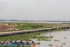 Khu Đô thị mới Phú Qúy lấn biển (thành phố Rạch Giá, tỉnh Kiên Giang) trong giai đoạn thi công mặt bằng và kè chống sạt lở. (Ảnh: Lê Huy Hải/TTXVN)