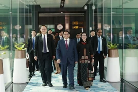 Thủ tướng Phạm Minh Chính và Phu nhân kết thúc chuyến thăm chính thức nước Cộng hòa Singapore. (Ảnh: Dương Giang/TTXVN)