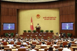 Bộ trưởng Bộ Giao thông Vận tải Nguyễn Văn Thắng trả lời chất vấn. (Ảnh: Doãn Tấn/TTXVN)