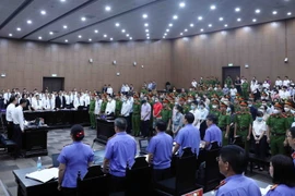 Quang cảnh phiên xét xử. (Ảnh: Phạm Kiên/TTXVN)
