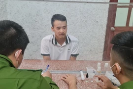 Đối tượng Lâm Đức Anh tại cơ quan điều tra. (Ảnh: TTXVN phát)