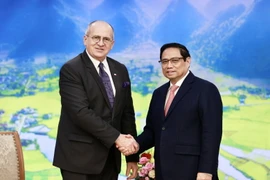 Thủ tướng Phạm Minh Chính tiếp Bộ trưởng Ngoại giao Cộng hòa Ba Lan Zbigniew Rau. (Ảnh: Dương Giang/TTXVN)