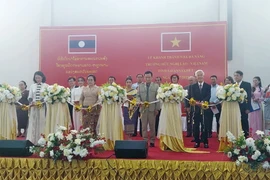 Lễ khánh thành và đưa vào sử dụng dự án Nhà đa năng Trường Hữu nghị Lào-Việt Nam tỉnh Savannakhet. (Ảnh: TTXVN phát)