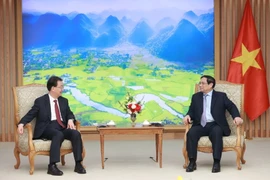 Thủ tướng Phạm Minh Chính tiếp ông Vương Ninh, Ủy viên Trung ương Đảng Cộng sản Trung Quốc, Bí thư Tỉnh ủy Vân Nam. (Ảnh: Dương Giang/TTXVN)