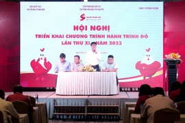 Các đại biểu tham gia thảo luận, chia sẻ, đề xuất những phương án, giải pháp hữu ích để hướng tới tổ chức một cách có hiệu quả chương trình. (Ảnh: Lê Ngọc Phước/TTXVN)