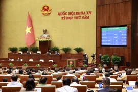 Quốc hội thông qua Luật Phòng thủ dân sự. (Ảnh: Doãn Tấn/TTXVN)