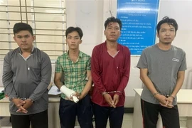 Các đối tượng bị bắt tạm giam. (Ảnh TTXVN phát)