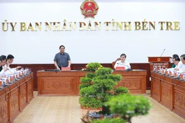 Thủ tướng Phạm Minh Chính chủ trì buổi làm việc. (Ảnh: Dương Giang/TTXVN)