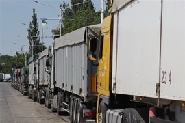 Xe tải chở lúa mỳ gần Izmail, thuộc vùng Odessa, Ukraine. (Ảnh: AFP/TTXVN)