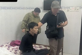 Đối tượng Vũ Văn Tình bị bắt về hành vi trộm cắp tài sản. (Ảnh: TTXVN phát)