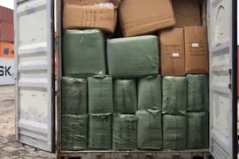 Container chứa hàng giả mạo xuất xứ ở Việt Nam. (Ảnh: TTXVN phát)
