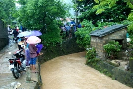 Khu vực chị Mai bị mất tích do nước cuốn. (Ảnh: Nguyễn Hoàng/Vietnam+)