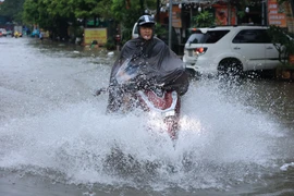 Hà Nội sáng 10/9 có ngập một số khu vực do mưa lớn sau đêm 9/9. (Ảnh: Hoài Nam/Vietnam+)
