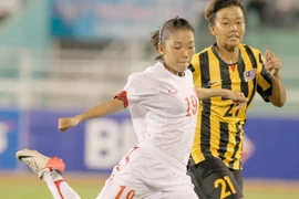 Đánh bại Malaysia 7-0, tuyển Việt Nam đặt 1 chân vào bán kết