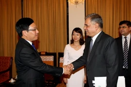 Phó Thủ tướng, Bộ trưởng Ngoại giao Phạm Bình Minh tiếp Thứ trưởng Ngoại giao Pakistan . (Ảnh: Phạm Kiên/TTXVN)