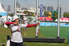 Các cung thủ Việt Nam giành huy chương vàng. (Ảnh: Quốc Khánh/TTXVN)