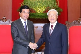 Tổng Bí thư Nguyễn Phú Trọng tiếp Đại sứ Lào Somphone Sichaleune. (Ảnh: Thống Nhất/TTXVN)